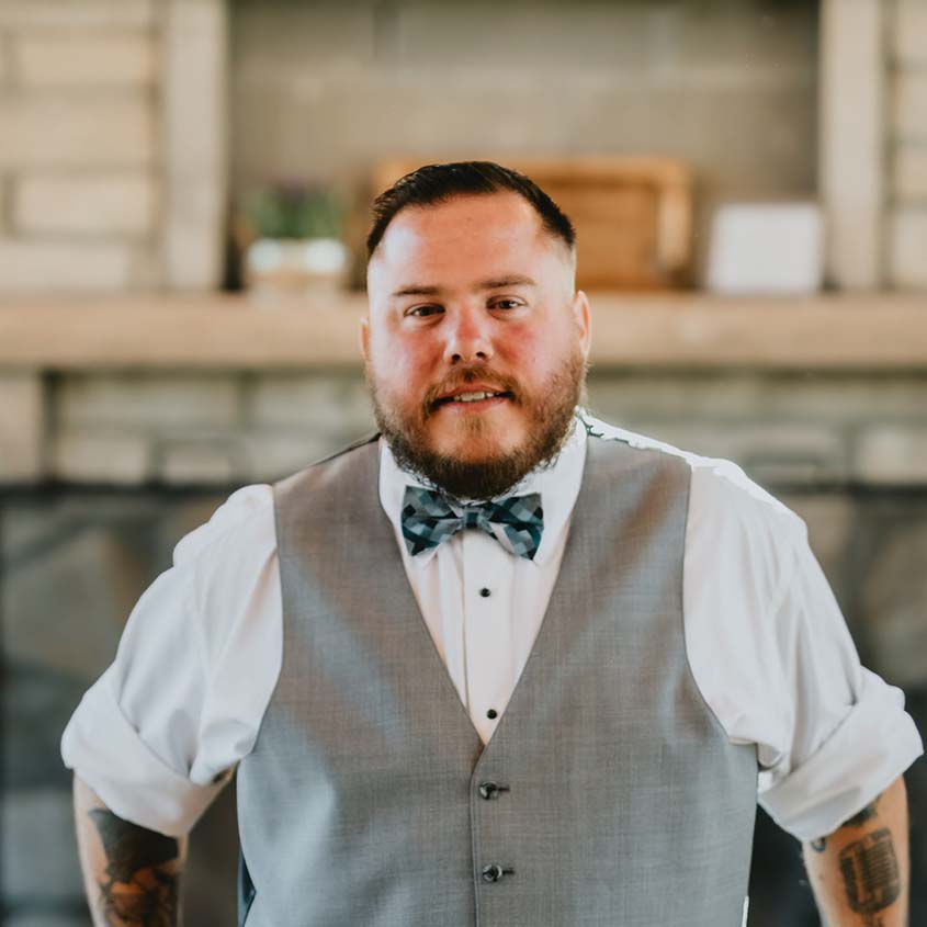 David Stephens' headshot wearing a bow tie